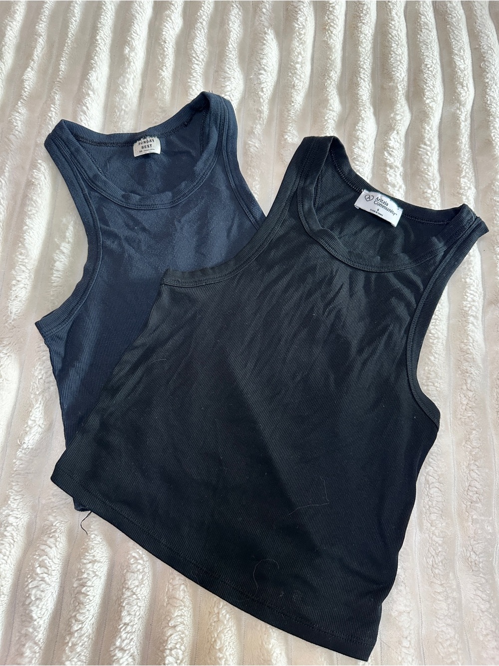 Two aritzia black tanks